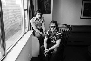 Lyricist Bernie Taupin and singer songwriter Elton John pose for a portrait in November, 1970 in New York City, New York