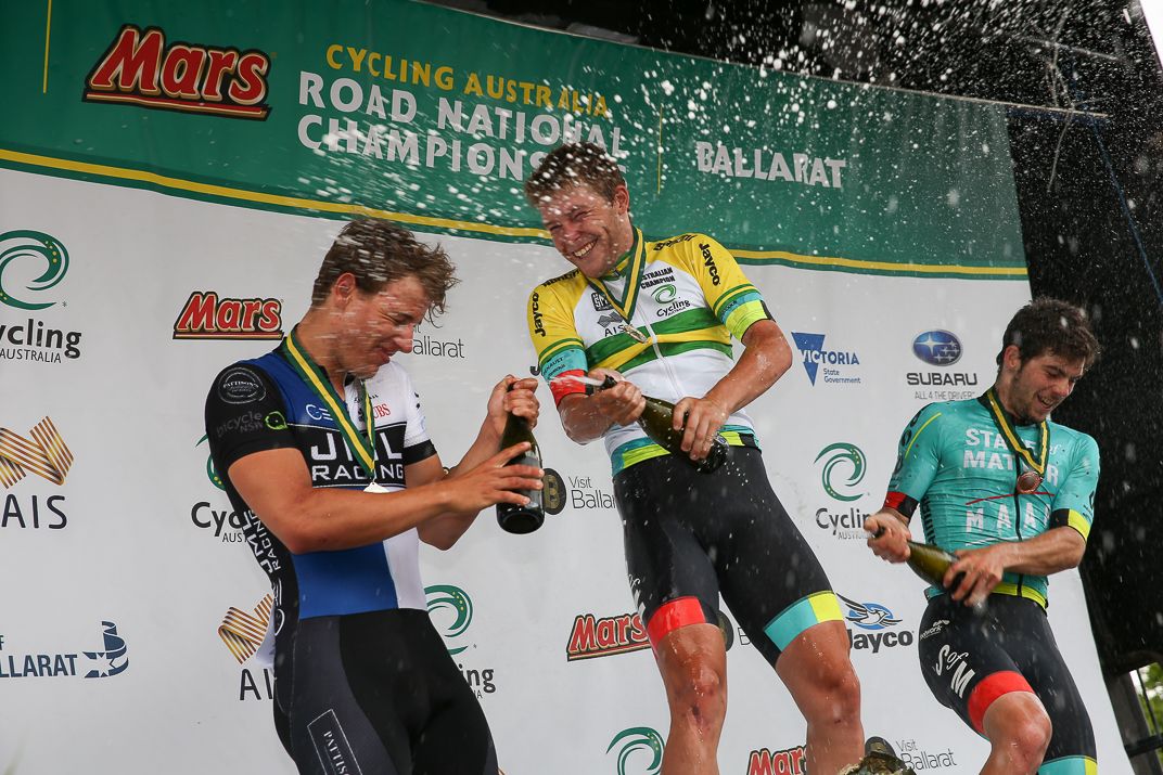 The top 3 spray the champagne