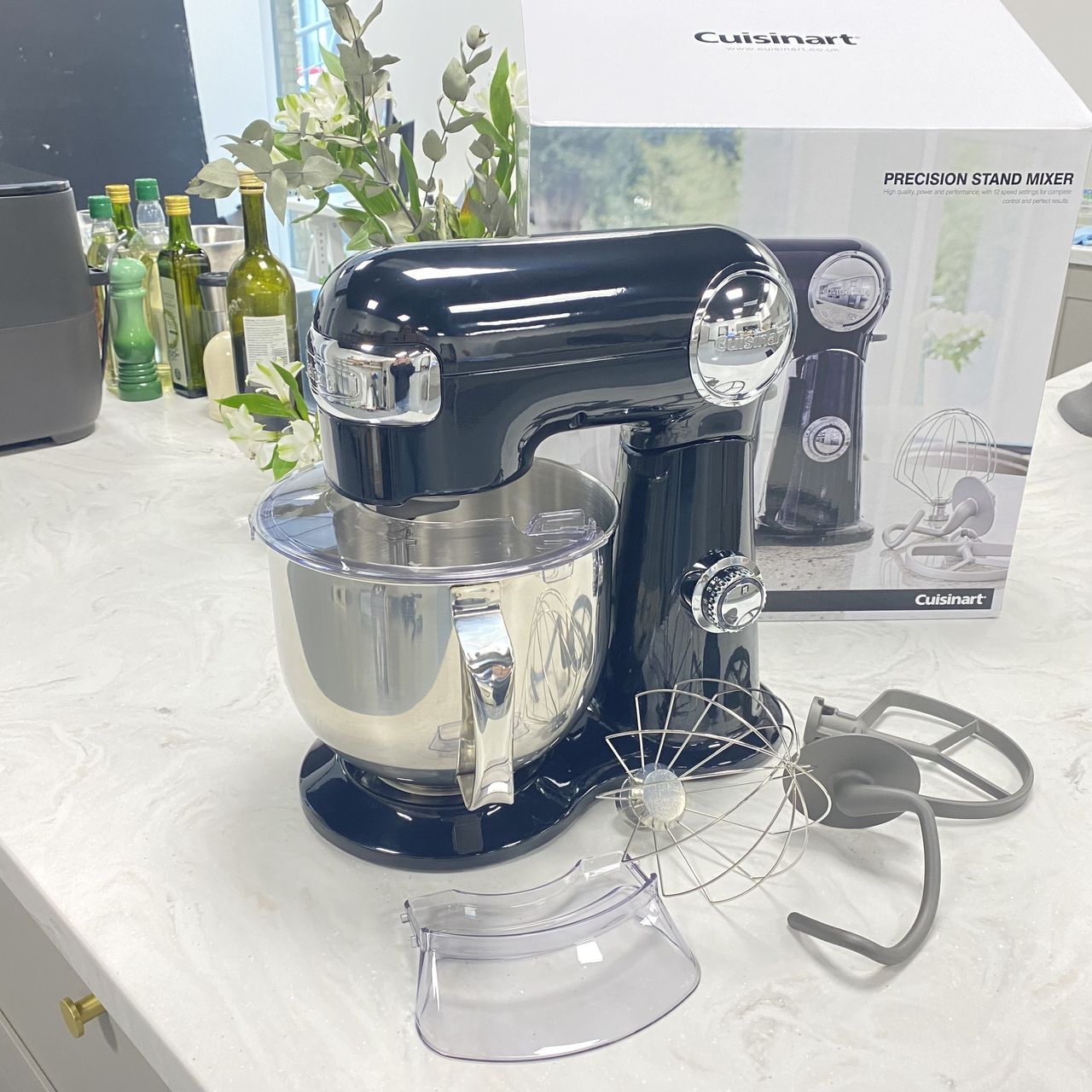 Testing a black Cuisinart mixer on a marble countertop