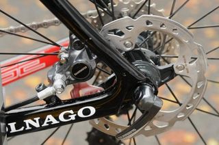 Colnago's Prestige disc machine has a neat rear caliper placement between the chain and seat stays