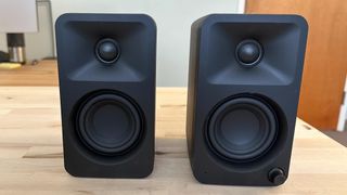 Kanto Ora speakers on a desktop