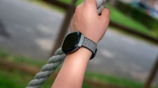 A child wearing the Fitbit Ace LTE