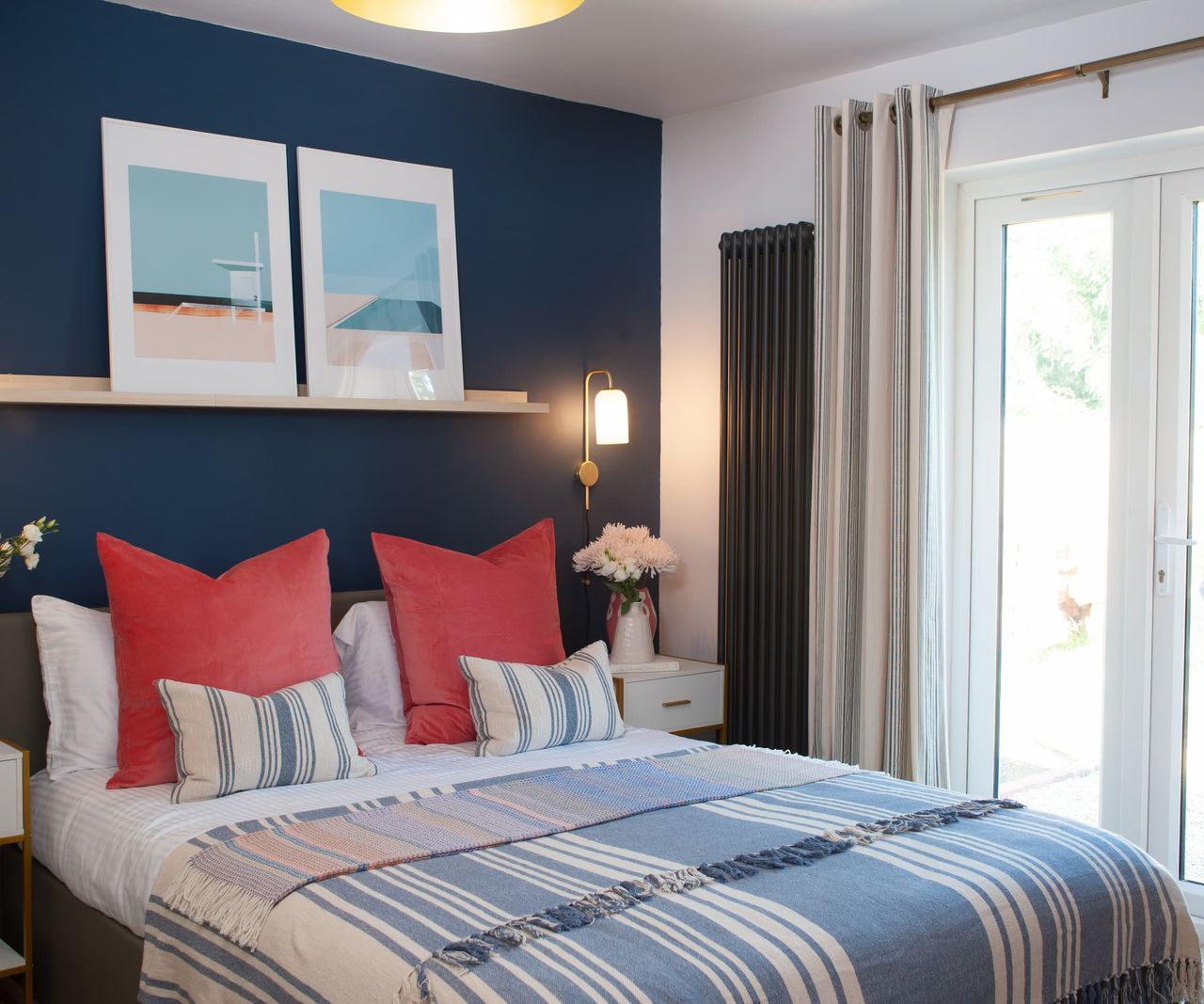 French doors leading from the bedroom to the decking outside