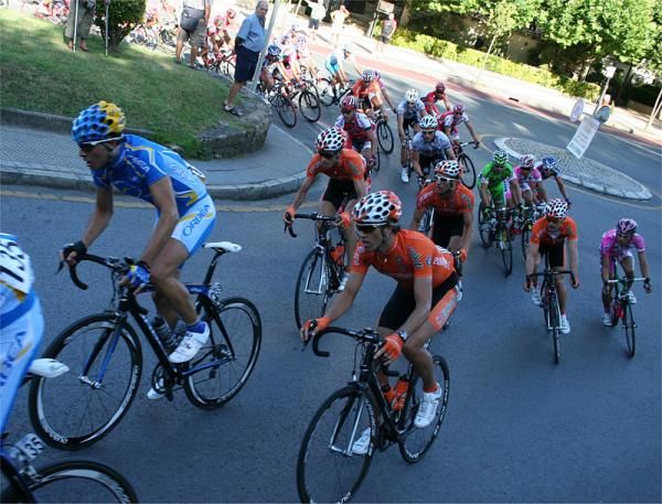 Riders head through the last bend.