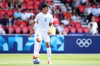 PARIS, FRANCE - JULY 24: Abdukodir Khusanovof Uzbekistan controls the ball during the Men's group C match between Uzbekistan and Spain during the Olympic Games Paris 2024 at Parc des Princes on July 24, 2024 in Paris, France. (Photo by Alex Grimm - FIFA/FIFA via Getty Images) Tottenham