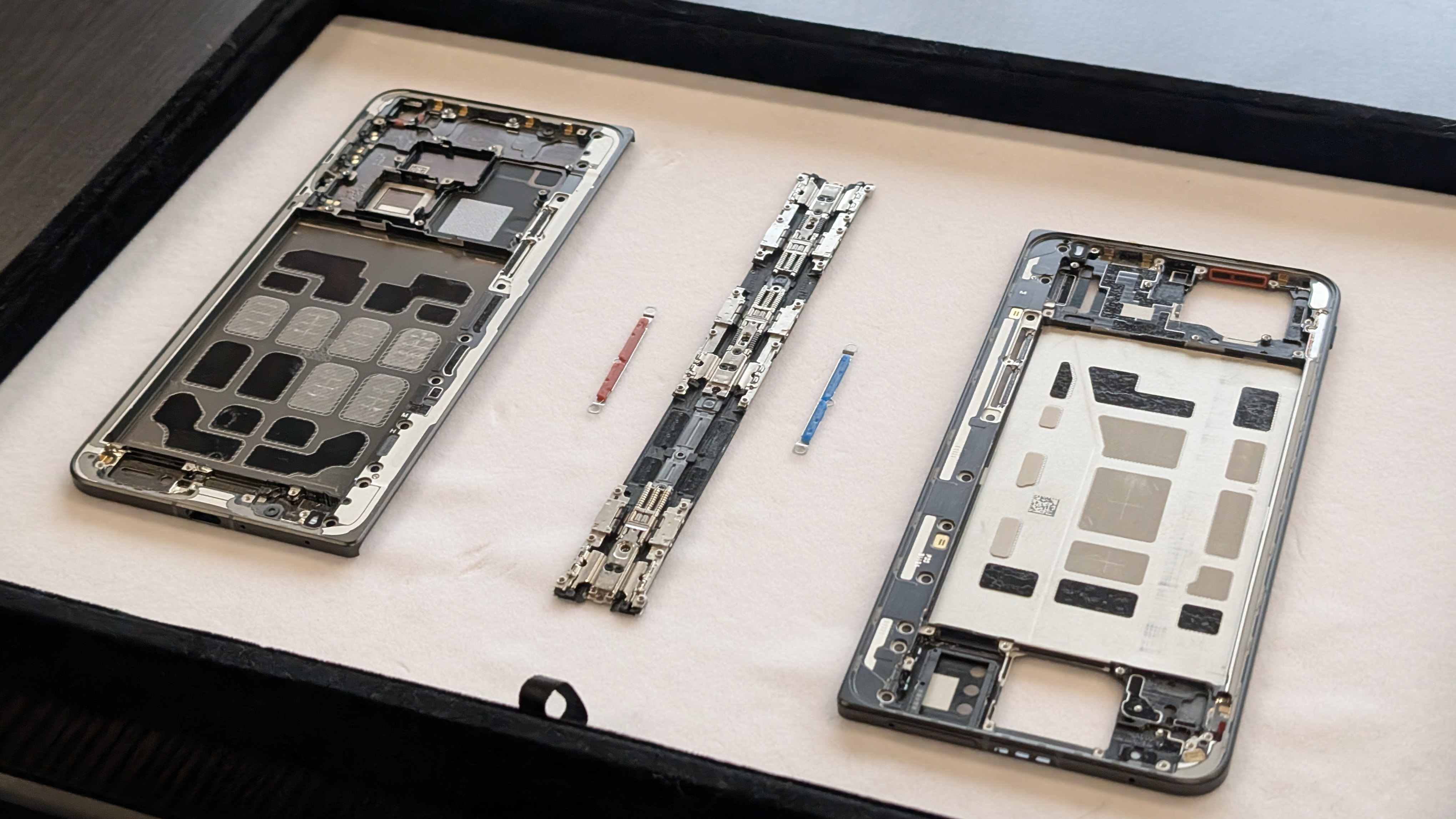 Oppo Find N5 internal parts laid out for display