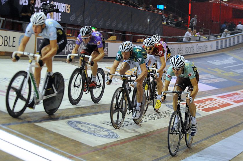 Belgian cyclist Iljo Keisse C competes in the men cycling individual pursuit of the Grenobles six days of cycling 6 jours cyclistes de Grenoble on October 27 2011 at the Palais des Sports in Grenoble eastern France The 40th edition of the Grenobles six days of cycling will run from today to November 1 2011 AFP PHOTO JEANPIERRE CLATOT Photo credit should read JEANPIERRE CLATOTAFP via Getty Images