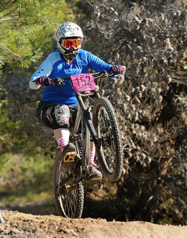 Jamime Rees rides through the pine trees