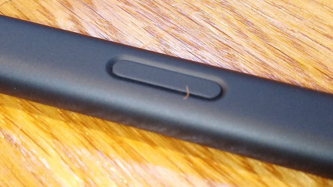 Surface Slim Pen 2 review; a close up of a stylus pen's side button
