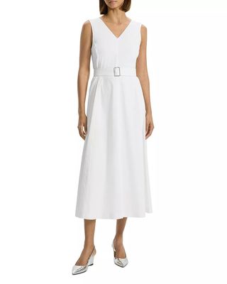 Model wearing white dress with belt