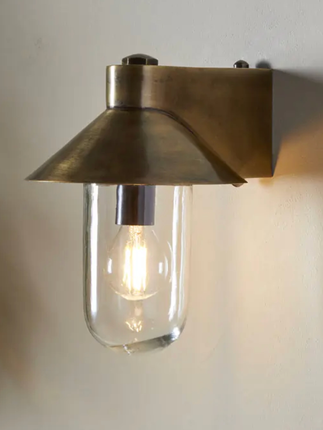 Nkuku, Singa Outdoor Wall Lamp - Antique Brass