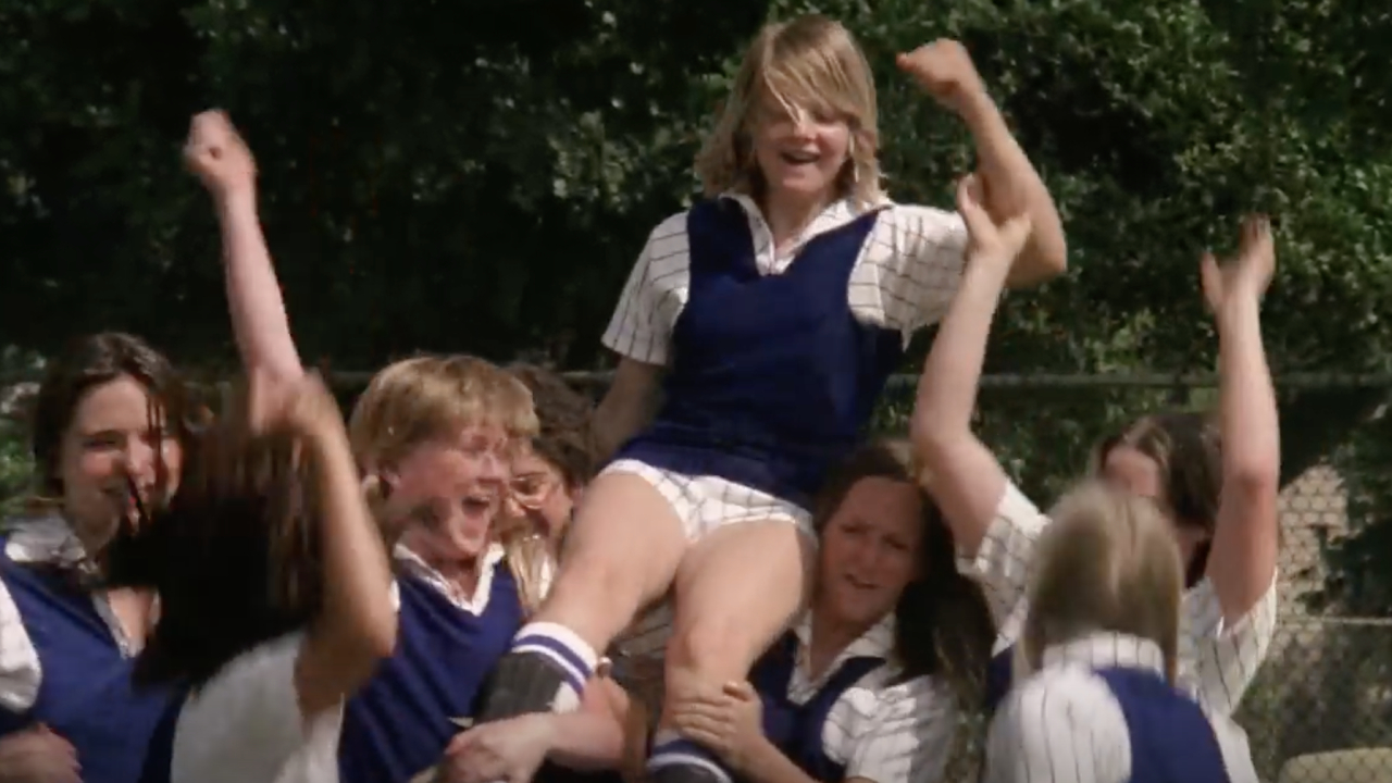 Annabel on the shoulders of her hockey teammates as they won the game in Freaky Friday.
