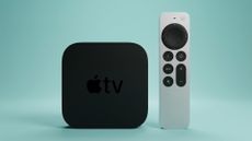 Apple TV 4K with remote on green background (edited using Gemini)