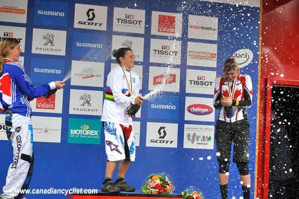 A bit of bubbly for Rachel Atherton, Emmeline Ragot, and Claire Buchar