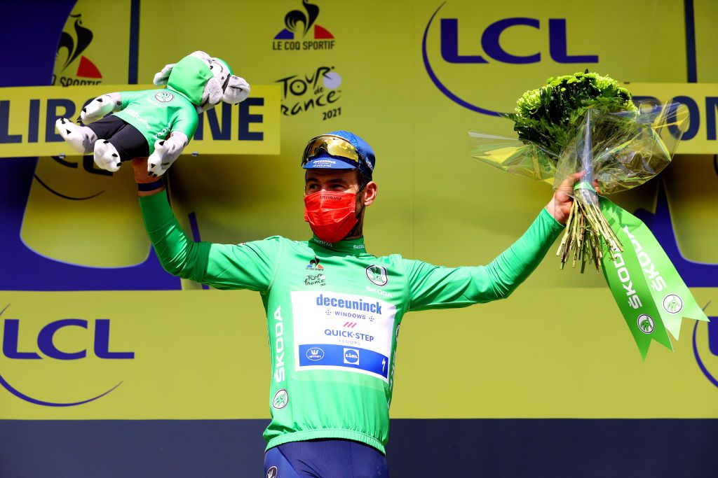 LIBOURNE FRANCE JULY 16 Mark Cavendish of The United Kingdom and Team Deceuninck QuickStep Green Points Jersey celebrates at podium during the 108th Tour de France 2021 Stage 19 a 207km stage from Mourenx to Libourne LeTour TDF2021 on July 16 2021 in Libourne France Photo by Tim de WaeleGetty Images