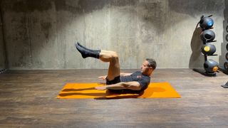 Matt Kendrick demonstrates how do the hundred Pilates pose