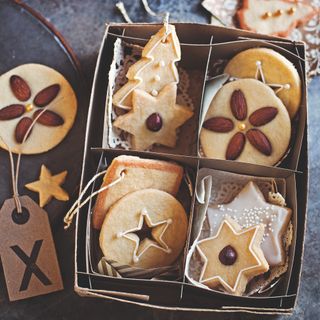 Baked Christmas sweets and biscuits in a paper box