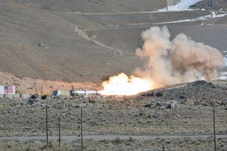 The second stage motor for Northrop Grumman's new OmegA rocket, the Castor 300, roars to life during a static fire at the company's propulsion facility in Promontory, Utah on Thursday, Feb. 27, 2020.