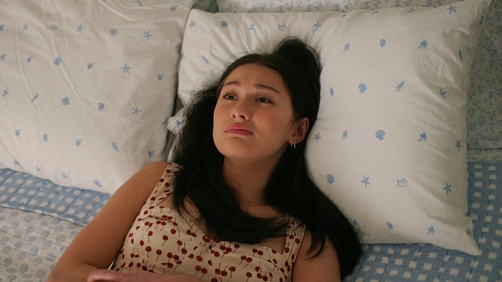 Belly cries on her bed