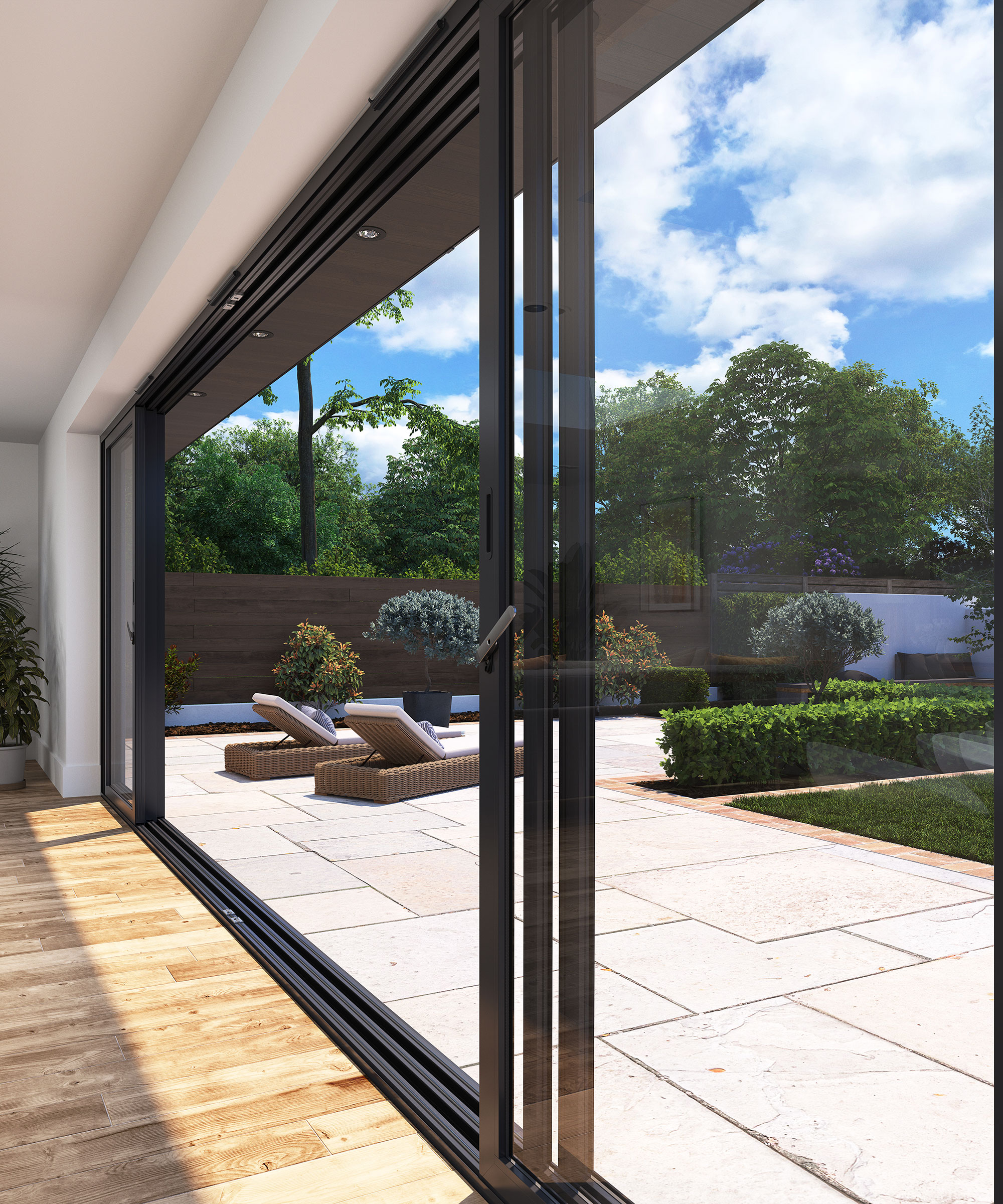 large modern sliding doors leading from an extension out to a patio space