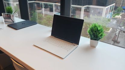 white laptop on table