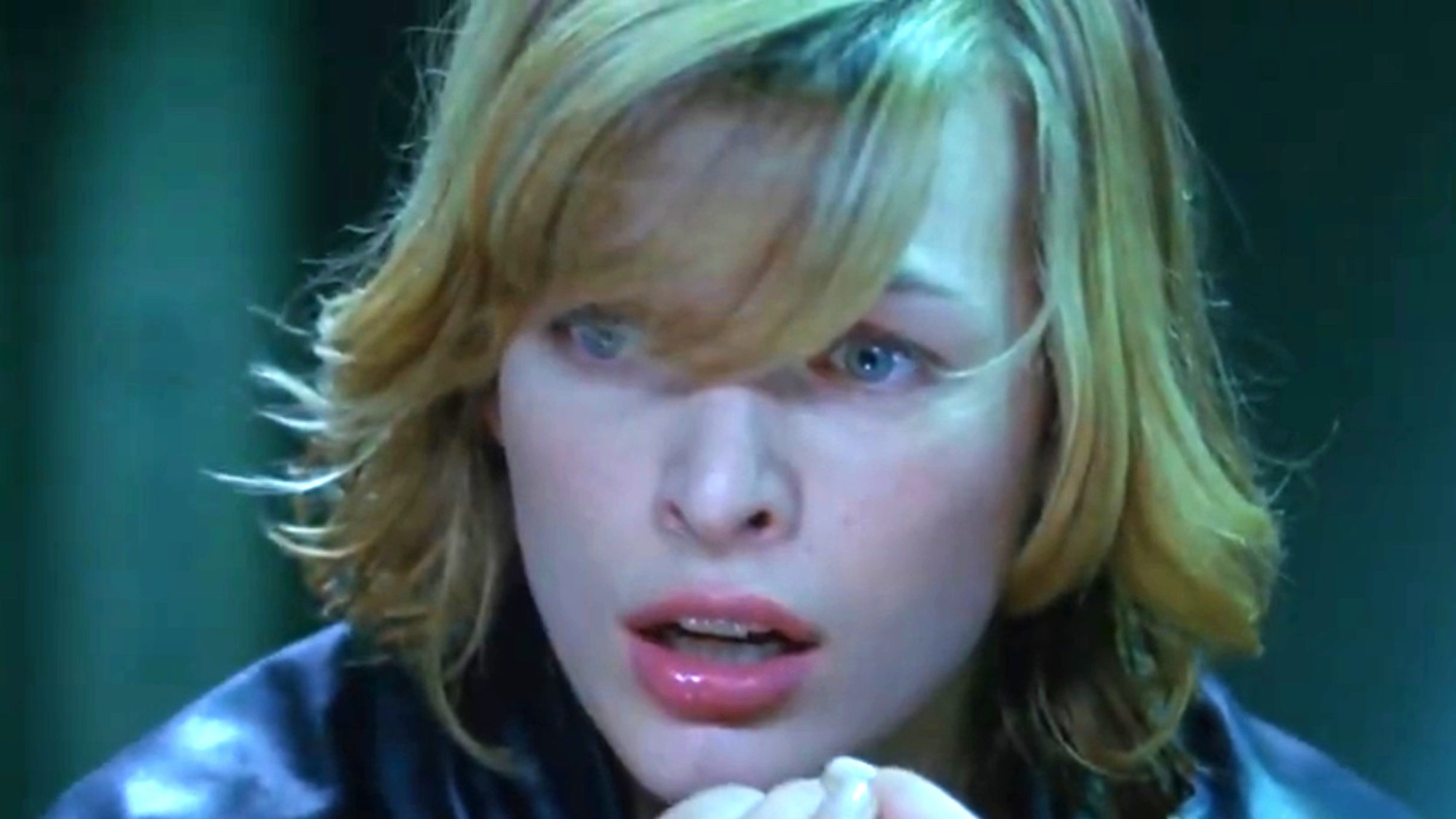 A frightened Milla Jovovich in Resident Evil