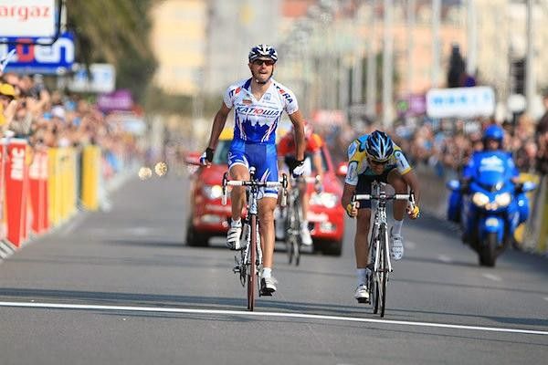 Alberto Contador (Astana) throws his bike but Antonio Colom (Team Katusha) claimed the stage win.