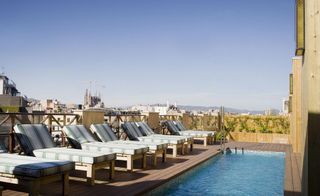 the roof top pool area at the the Cotton House Hotel in Barcelona