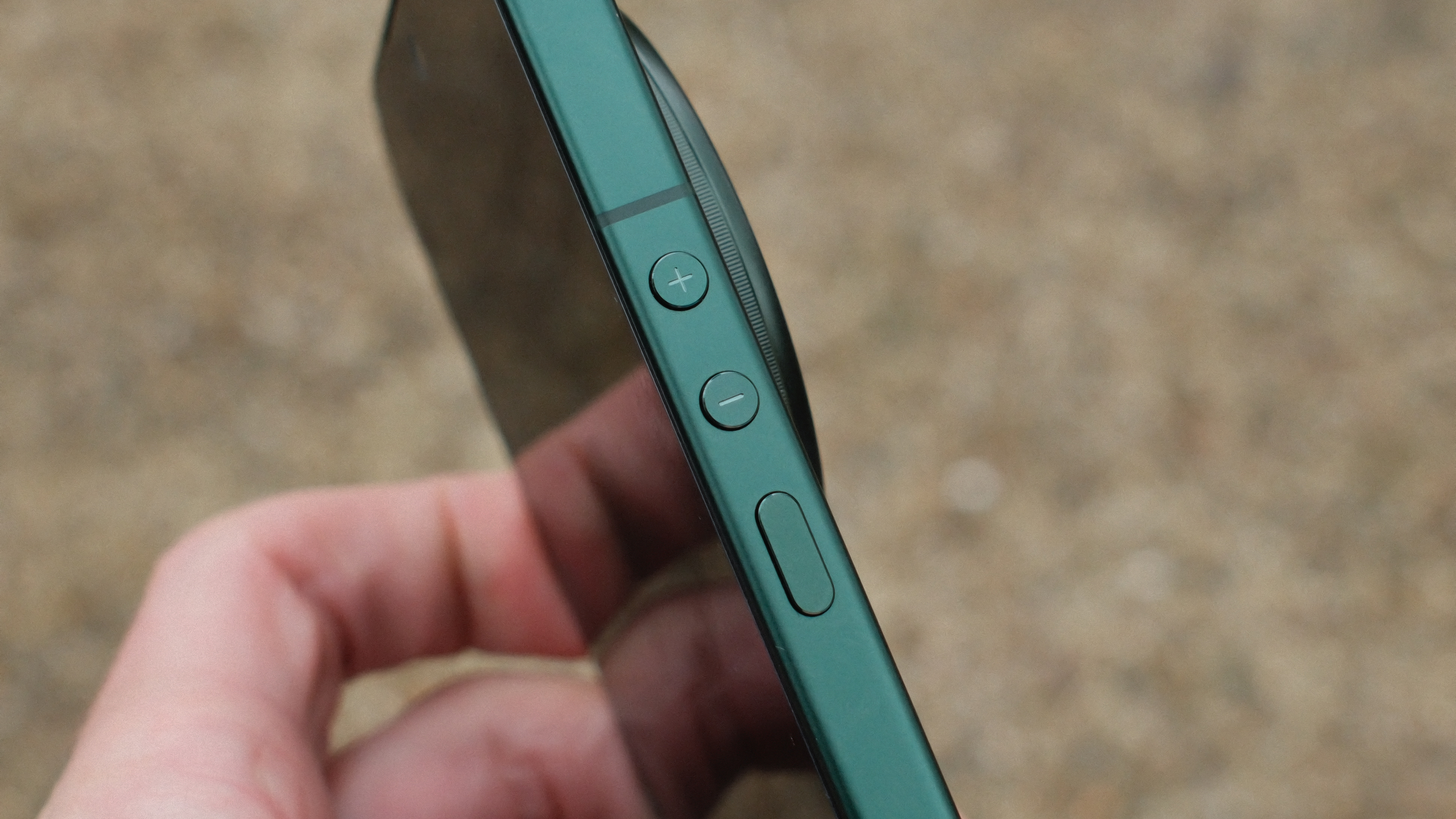 Side view of the Xiaomi 17 Ultra displaying the volume buttons and power button beside the protruding circular camera module.