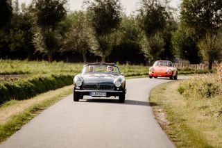 Vintage cars on road during Zoute Grand Prix 2023, Knokke-Heist, Belgium