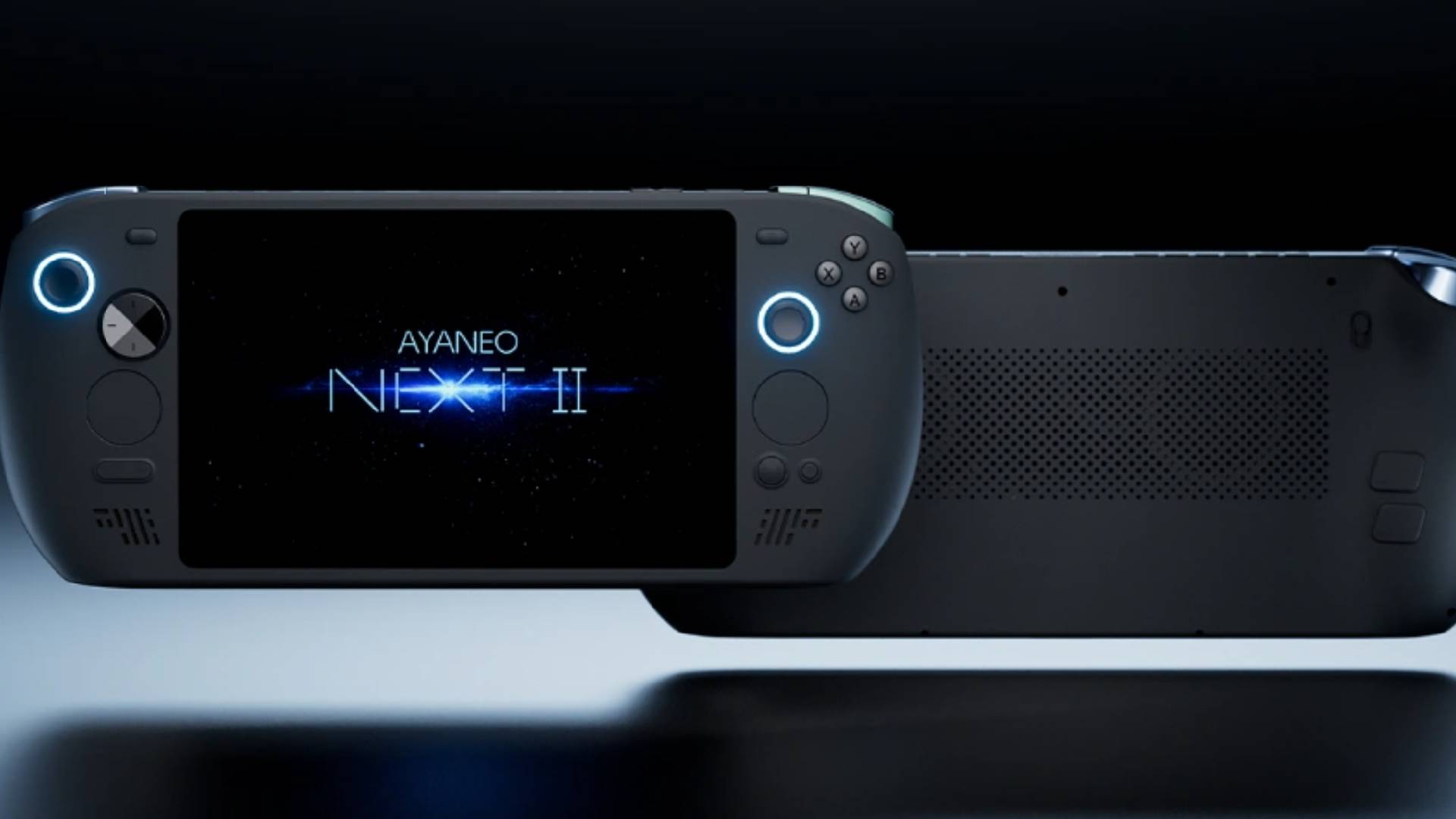 Back and front view of black Ayaneo Next 2 handheld with dark backdrop.