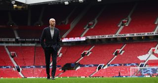 Manchester United manager Erik ten Hag walks on the pitch before the UEFA Champions League match between Manchester United and F.C. Copenhagen at Old Trafford on October 24, 2023 in Manchester, England.