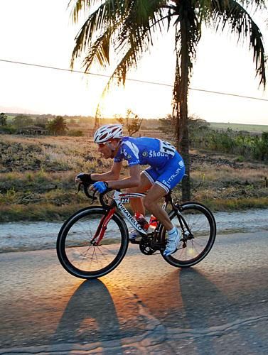 Italian rider Angelo Ciccone puts his head down and motors in the sunset.