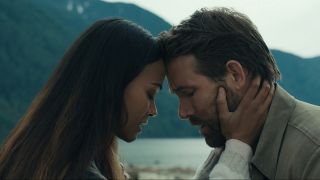 Zoe Saldana and Ryan Reynolds in romantic moment in The Adam Project