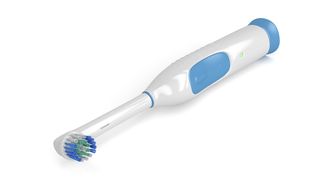 Best electric toothbrushes: A blue and white toothbrush photographed on its side