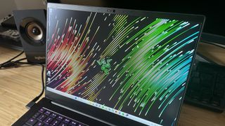 Close up on Razer Blade 14 laptop screen showing wallpaper