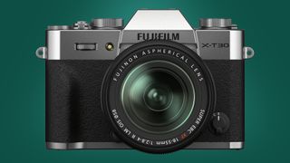 The Fujifilm X-T30 II camera on a green background