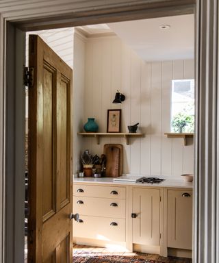 country kitchen featuring gentle yellow shades on cabinets