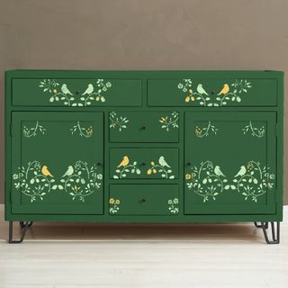 Stenciled sideboards in green with bird prints