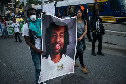 People protest the verdict in the Philando Castile case.