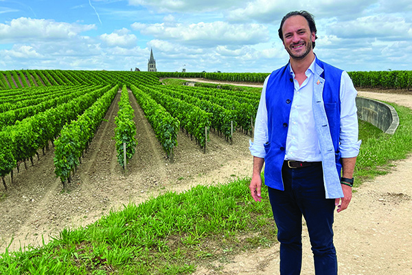 Edouard-Moueix-by-the-vines-of-Chateau-Belair-Monange.-Credit-Panos-Kakaviatos.jpg