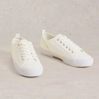 white canvas trainers