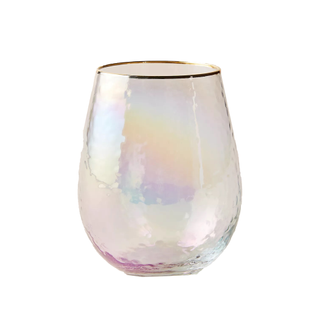 An iridescent stemless wine glass with a gold rim