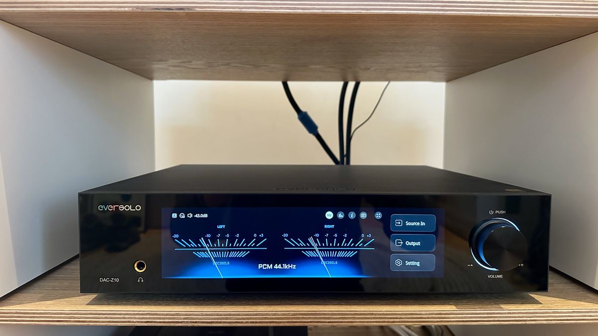 The Eversolo DAC-Z10 on a hi-fi rack, with some virtual VU meters displayed on the screen