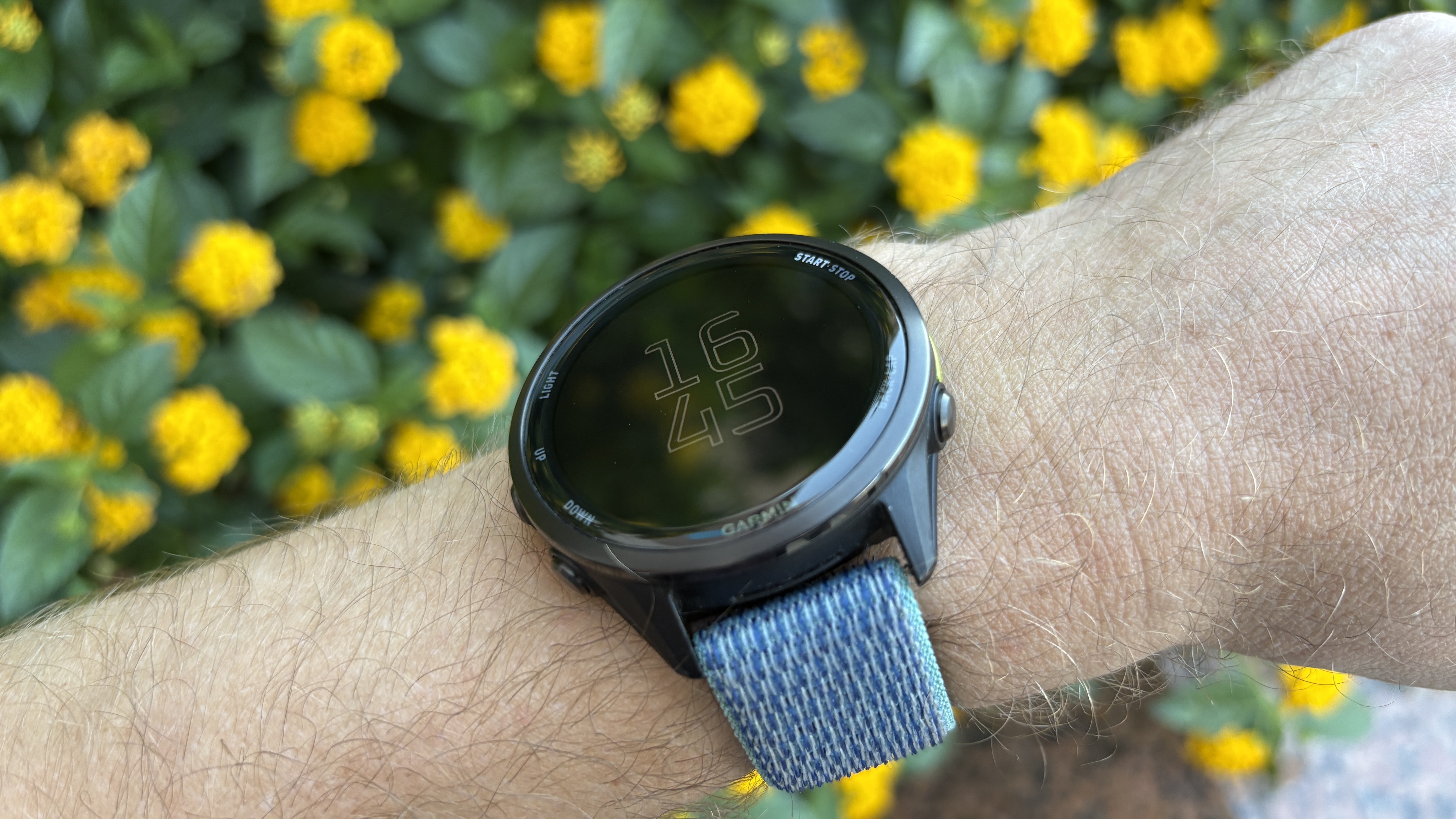 Garmin Forerunner 970 on man&#039;s wrist