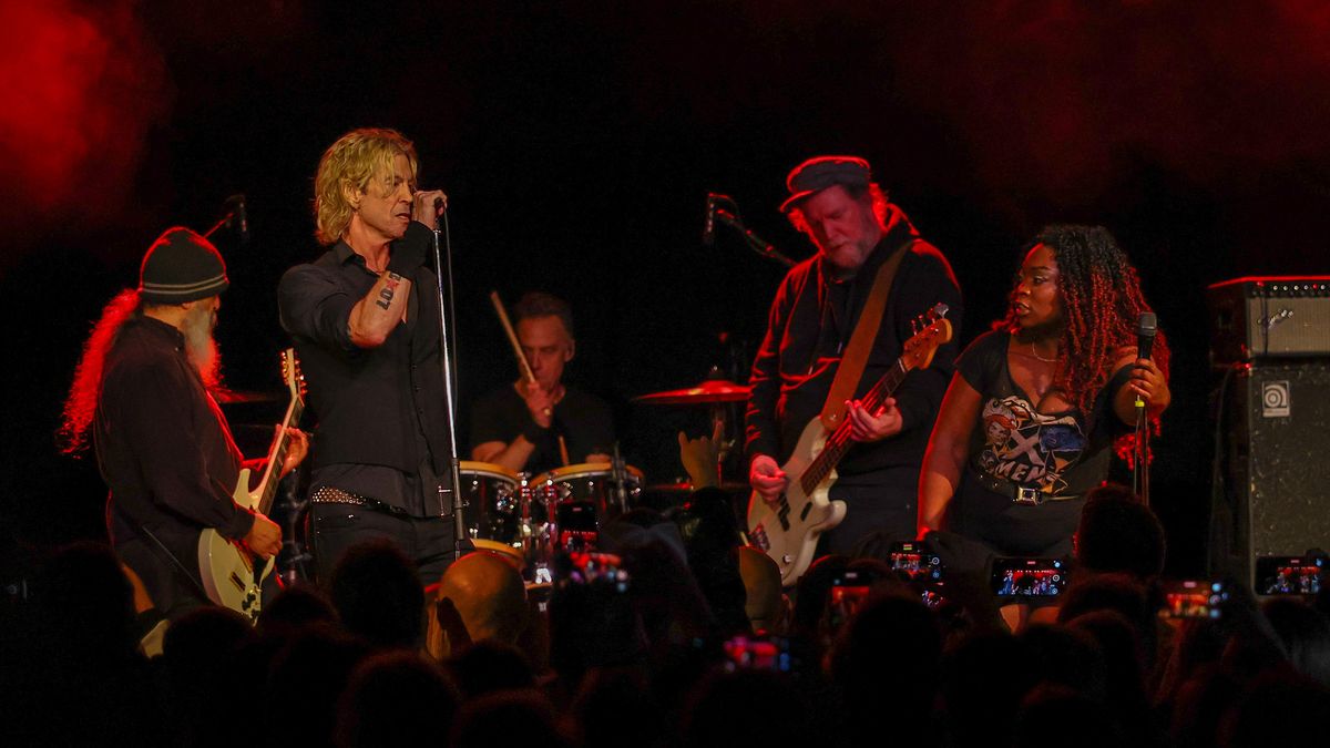 Soundgarden members and Duff McKagan on stage