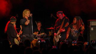 Soundgarden members and Duff McKagan on stage