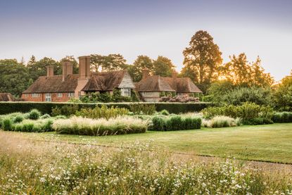 Looking from the wildflower meadow over the Wind Garden. Folly Farm in Sulhamstead, Berkshire. &copy;Jason Ingram