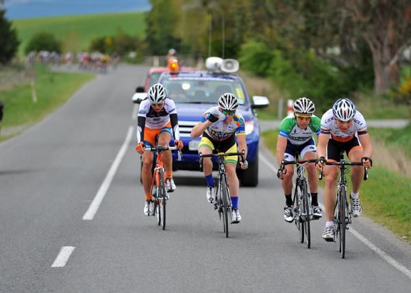 The four remaining riders in the break are about to be caught with 20km remaining