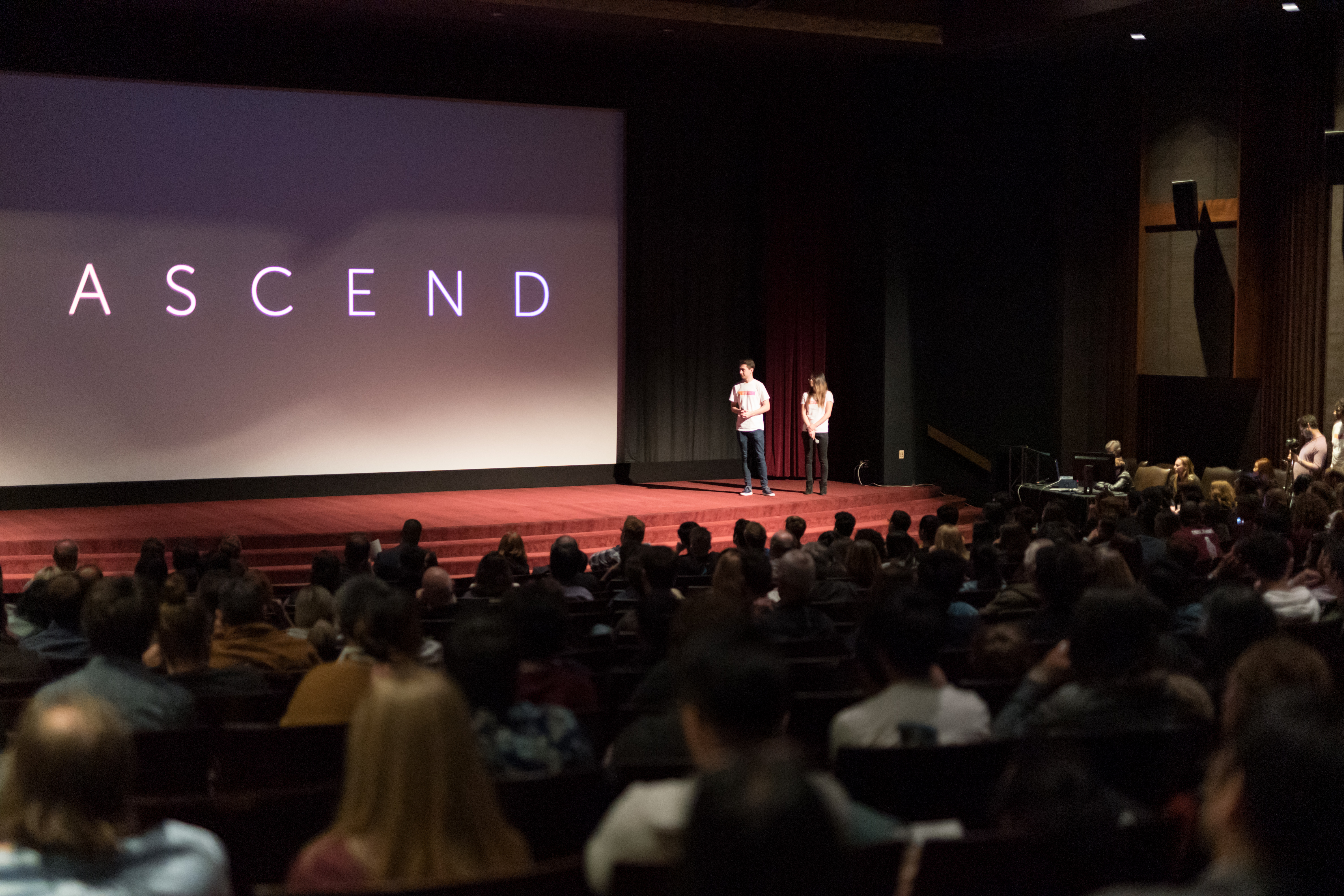 college students attending a presentation